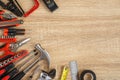 New of assorted work tools on wood with copy space for text Royalty Free Stock Photo