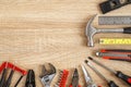 New of assorted work tools on wood with copy space for text Royalty Free Stock Photo