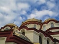 The new Athos monastery in Abkhazia. Blue sky, Golden domes, Orthodox Church. Royalty Free Stock Photo