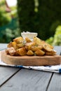 New baked potatoes with butter and thyme Royalty Free Stock Photo