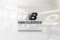 New balance on glossy office wall realistic texture