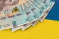 1000 new banknote of Ukraine on yellow blue background. Save and money cocncept Royalty Free Stock Photo