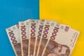 1000 new banknote of Ukraine on yellow blue background. Save and money cocncept Royalty Free Stock Photo