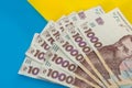 1000 new banknote of Ukraine on yellow blue background. Save and money cocncept Royalty Free Stock Photo