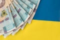 1000 new banknote of Ukraine on yellow blue background. Save and money cocncept Royalty Free Stock Photo