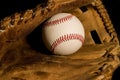 New baseball Old glove Royalty Free Stock Photo