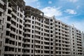 new beautiful buildings under construction stand on a background of beautiful sky Royalty Free Stock Photo