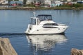 Motoryacht On Your Own V crossing New Bedford inner harbor