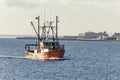 Commercial fishing boat Ocean Scout nearing New Bedford on bright winter morning