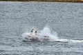 Lobster boat getting some air in choppy water Royalty Free Stock Photo