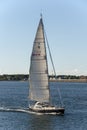 Sailboat Kismet crossing New Bedford outer harbor Royalty Free Stock Photo