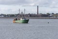 Commercial fishing boat Harmony waiting for New Bedford  hurricane barrier to re-open Royalty Free Stock Photo