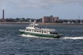 Cuttyhunk Ferry passing Tripp Towers in New Bedford harbor