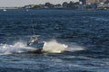 Rough ride aboard powerboat crossing wind-driven chop