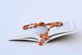 New bible and rosary on light background Royalty Free Stock Photo