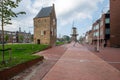 A new bike path along the Bagijnetoren, and windmill de Roos in