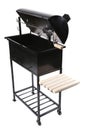 New black barbecue with a cover over