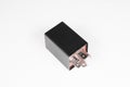 New black electric auxiliary coil power relay magnetic contactor 12v auto parts on gray gradient background Royalty Free Stock Photo