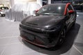 new black electric SUV Smart Hashtag 3 in showroom, trends EV contemporary Europe, technology automotive industry, environmental