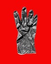 New black latex glove with thumb folded on red background. disposable dirty rubber gloves. Protective subject