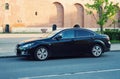 New black Mazda 6 Atenza parked on the street of ancient old russian town Smolensk.