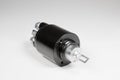 New black solenoid for a starter for a car on a gray gradient background. Auto parts. Starter Parts Royalty Free Stock Photo