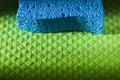 New blue sponge on washcloth Royalty Free Stock Photo