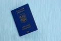 Blue Ukrainian passport lies on the table