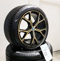 Brand new BMW car wheels with mounted the low-profile Pirelli tyres in showroom