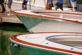 New boats at the Miami International Boat Show. Closuep detail of front deck with teak wood and stainless steel trim Royalty Free Stock Photo