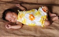 New born asian baby girl sleeping in cute dress Royalty Free Stock Photo