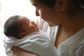 New born baby boy resting in mothers arms Royalty Free Stock Photo