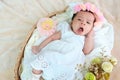 New born baby sleep on the basket or on the bed and keep smile with everyone. Feeling love the new born baby and need to take care Royalty Free Stock Photo