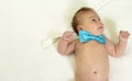 New born baby wearing a blue bowtie Royalty Free Stock Photo