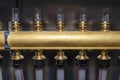 New brass manifold for underfloor heating systems with magnetic rotameters, seen up close.