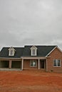New Brick Home Under Construction - vertical Royalty Free Stock Photo