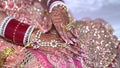 new Bride wear Bride clothes and wear new bracelet, red Hina Mehndi design in hand