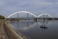 New bridge over Danube in Novi Sad, two fishermen in the boat on Royalty Free Stock Photo