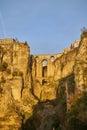 The new bridge of the village of Ronda in the rays of the setting sun