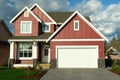 New Red House Home With White Trim Royalty Free Stock Photo