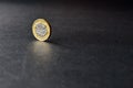New british one sterling pound coin on dark background Royalty Free Stock Photo