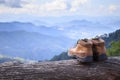 New brown leather shoe on mountain view point. Adventure concept Royalty Free Stock Photo