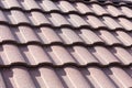 New brown roof tile close up. background texture. hight contrast Royalty Free Stock Photo