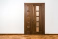 New brown wooden door in house interior Royalty Free Stock Photo
