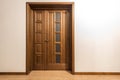 New brown wooden door in house interior Royalty Free Stock Photo