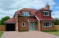 New build, empty, detached family house with garage. Royalty Free Stock Photo