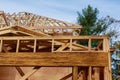 New build roof with wooden home construction framing Timber frame house, real estate. Royalty Free Stock Photo