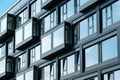 New building facade , windows on apartment house exterior Royalty Free Stock Photo