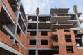 New building of a red brick multi-storey residential building. Background Royalty Free Stock Photo