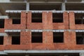 New building of a red brick multi-storey residential building. Background Royalty Free Stock Photo